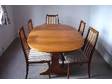 Extendable Teak dining table and five chairs. Extendable....